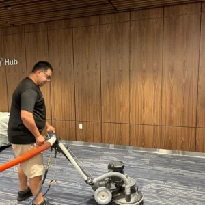 Vital Clean technician operating the RX20 NEXTGEN Rotary Extractor for 1300 times cleaner Hot Water Extraction (HWE).